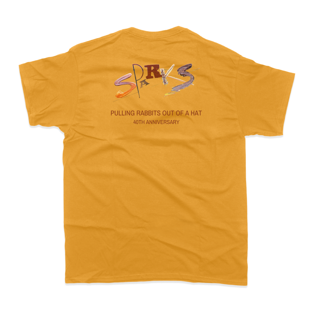 Yellow t-shirt with ’SPARKS’ text and ’PULLING RABBITS OUT OF A HAT’ printed on the back.