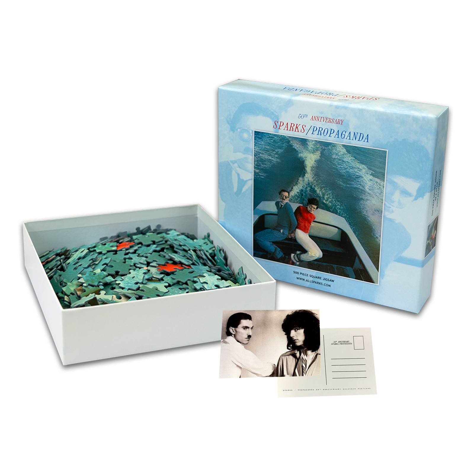 Jigsaw puzzle set featuring an album cover image and pieces in an open box.